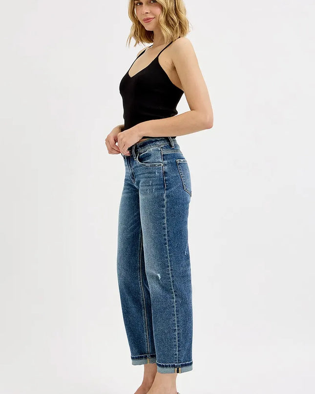 Side view showing cropped leg and relaxed fit of plus size boyfriend jeans