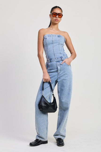 Light-wash strapless denim jumpsuit featuring a fitted corset-style bodice, ruched top hem, and wide-leg pants.