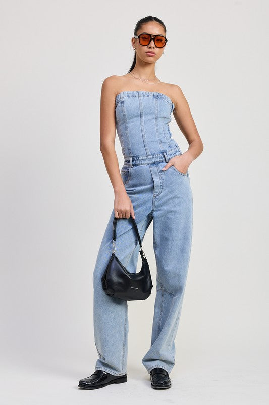 Light-wash strapless denim jumpsuit featuring a fitted corset-style bodice, ruched top hem, and wide-leg pants.
