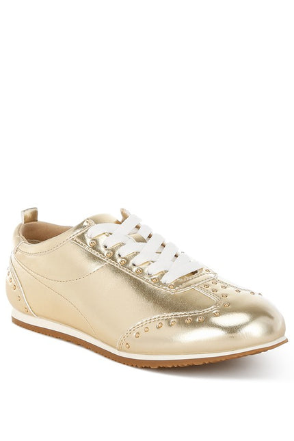 Women's gold metallic studded sneakers – right angle view