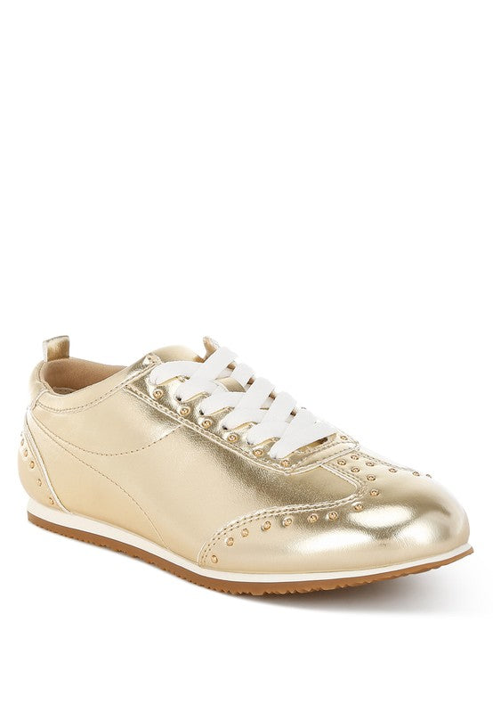 Women's gold metallic studded sneakers – right angle view